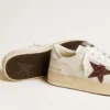 Zapatillas Stardan para mujer en napa con estrella brillante y lengüeta del talón de piel metalizada
