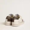 Zapatillas Stardan para mujer en piel blanca con estrella marrón brillante y lengüeta en el talón