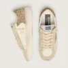 Zapatillas Stardan para mujer en piel napa color crudo con estrella dorada brillante y lengüeta en el talón