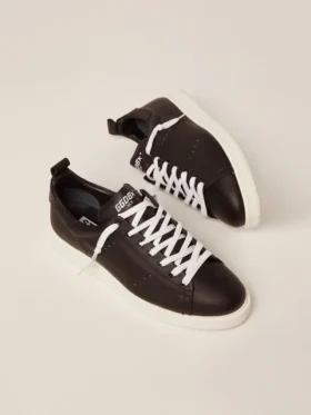 Zapatillas Starter para hombre de piel con estrella estampada en la lengüeta del talón
