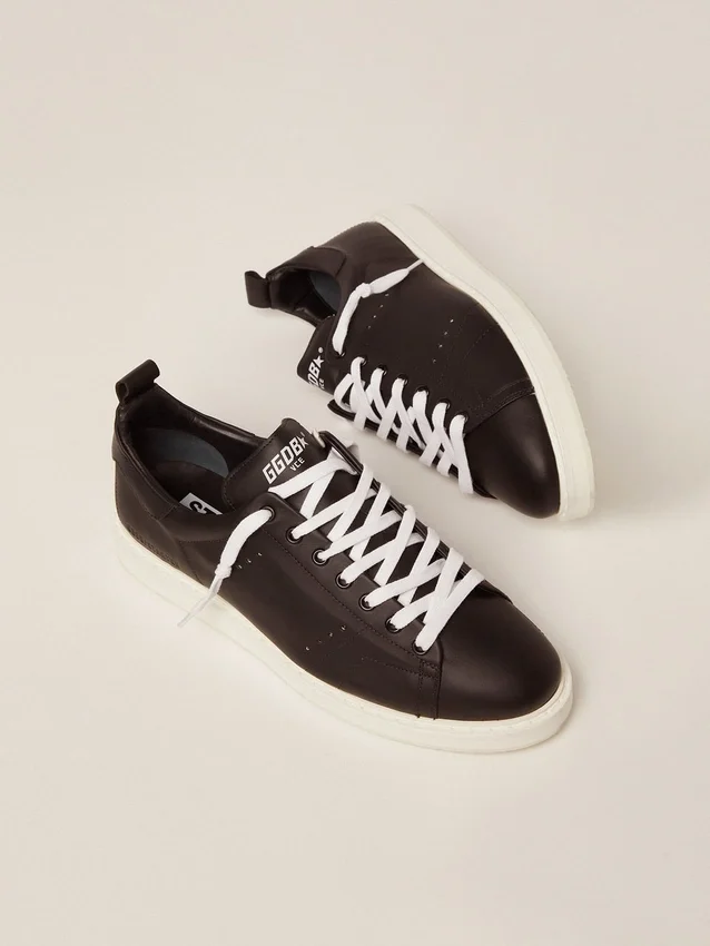Zapatillas Starter para hombre de piel con estrella estampada en la lengüeta del talón