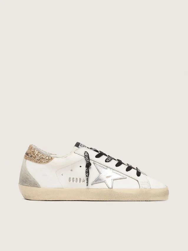 Zapatillas Super-Star de piel blanca para mujer con lengüeta dorada brillante en el talón