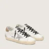 Zapatillas Super-Star de piel blanca para mujer con lengüeta dorada brillante en el talón