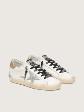 Zapatillas Super-Star de piel blanca para mujer con lengüeta dorada brillante en el talón