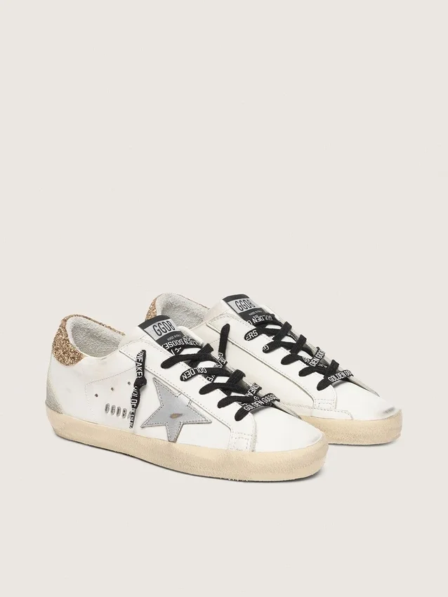 Zapatillas Super-Star de piel blanca para mujer con lengüeta dorada brillante en el talón