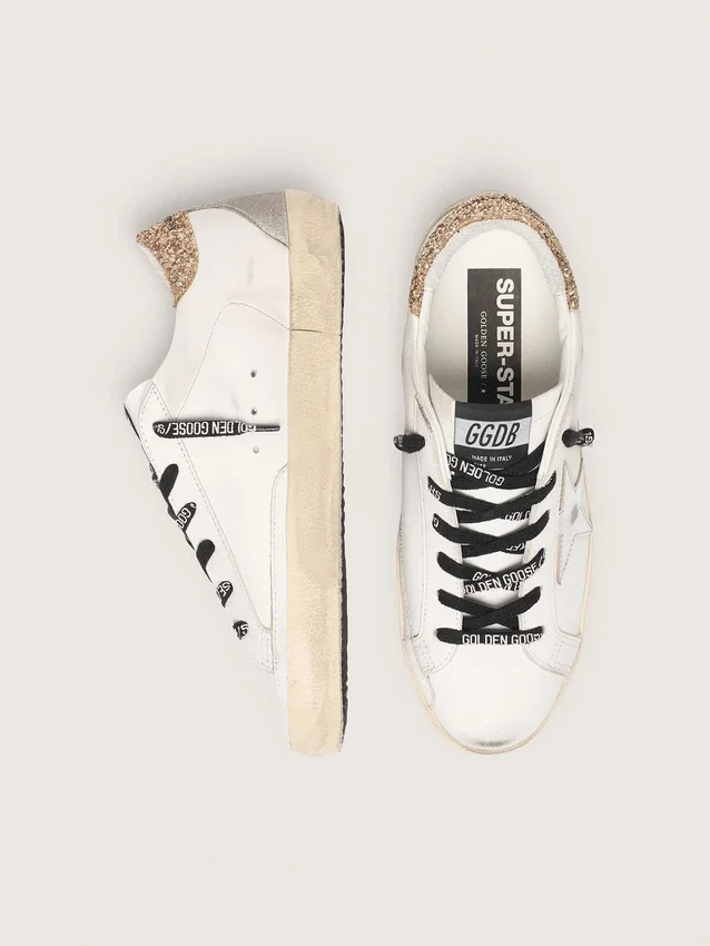Zapatillas Super-Star de piel blanca para mujer con lengüeta dorada brillante en el talón