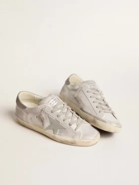 Zapatillas Super-Star en piel gris-blanca con efecto purpurina y estrella de piel