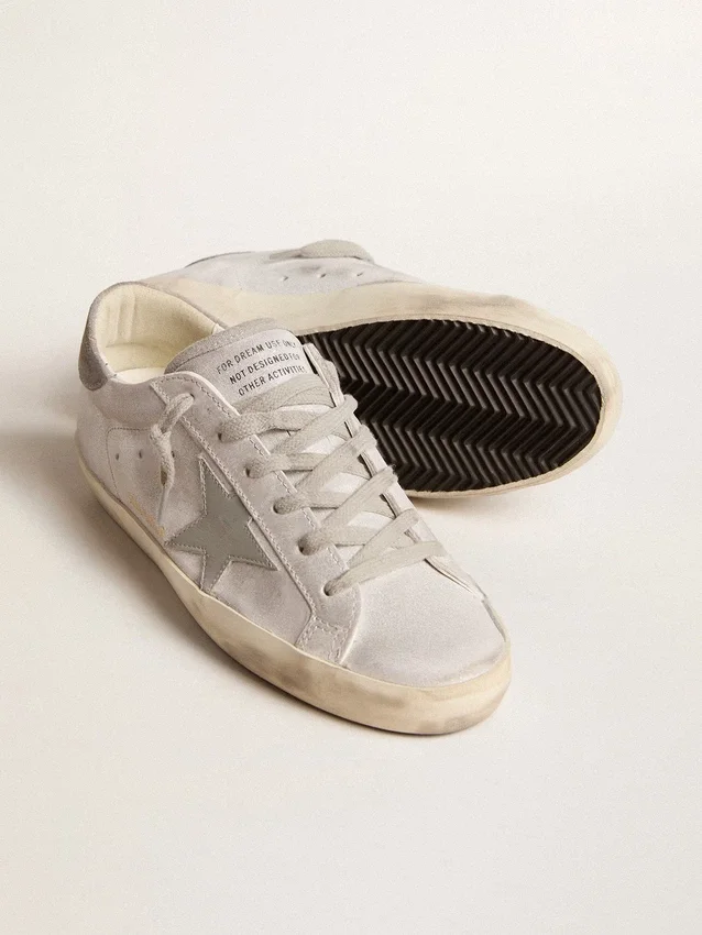 Zapatillas Super-Star en piel gris-blanca con efecto purpurina y estrella de piel