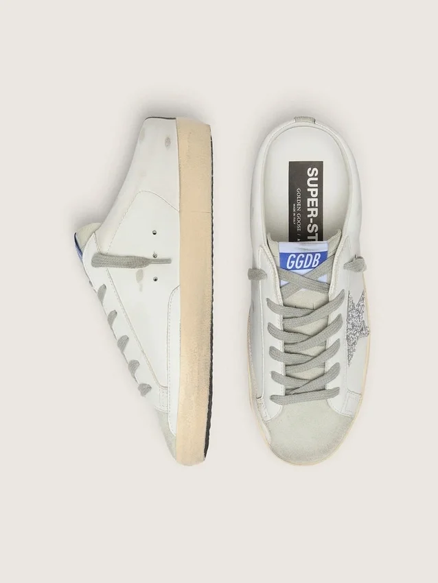 Zapatillas Super-Star Sabot con una estrella de purpurina platino y lengüeta de ante