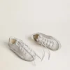 Zapatillas Super-Star Ski para mujer en nailon gris claro con estrella y lengüeta en el talón de piel metalizada