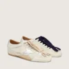Zapatillas True-Star para mujer en ante gris claro con estrella plateada metalizada y lengüeta en el talón