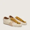 Zapatillas True-Star para mujer en piel napa blanca con estrella dorada y lengüeta del talón de ante beige