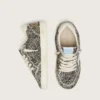 Zapatillas «Young Ball Star» en piel de potro con estampado de leopardo en blanco y negro y estrella de cuero color crema