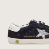 Zapatillas «Young Old School» de ante azul con estrella plateada brillante y lengüeta de cuero blanco en el talón