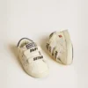 Zapatos escolares para bebé en piel napa con estampado musical y estrella de ante blanco