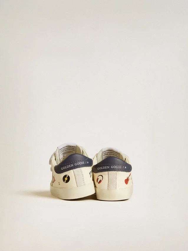 Zapatos escolares para bebé en piel napa con estampado musical y estrella de ante blanco