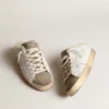 Zapatos tipo Super-Star Sabot con estrella de piel blanca y forro de piel de oveja