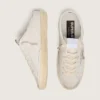 Zapatos tipo Super-Star Sabot para mujer, de piel blanca con una estrella de Swarovski